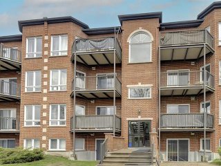 #402 - 4975 Boul. St-Charles — photo 1