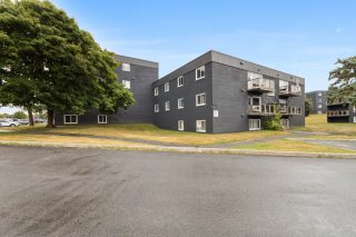 #203 - 84 Rue Front